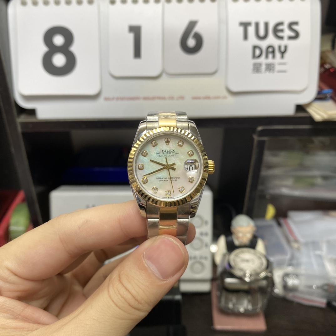 Rolex Datejust Series m278273-0027, Mother-of-Pearl Dial with Diamond Hour Markers Fluted Bezel, 31mm size, Oyster stainless steel bracelet.